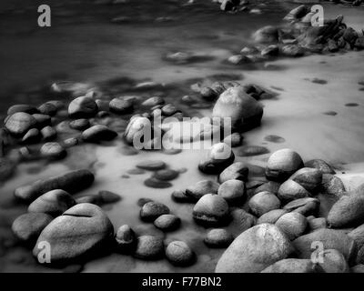 Boulders on beach shore of Lake Tahoe, Nevada Stock Photo