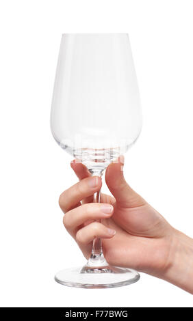 Close up of female hand holding empty clean transparent wine glass against white background. Stock Photo