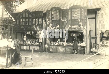 Real photograph postcard of stalls at village fete Stock Photo