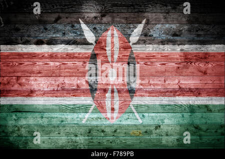A vignetted background image of the flag of Kenya painted onto wooden boards of a wall or floor. Stock Photo