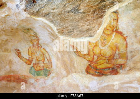 Sigiriya - ancient frescoes, cave wall paintings inside Sigiriya fortress, Sri Lanka, UNESCO World Heritage Site Stock Photo