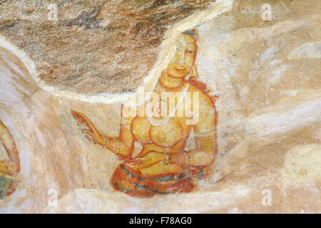 Sri Lanka - ancient frescoes, cave wall paintings inside Sigiriya fortress, UNESCO World Heritage Site Stock Photo