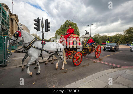 A Royal horse drawn-carriage seen on main road near Hyde Park, London, UK. Stock Photo