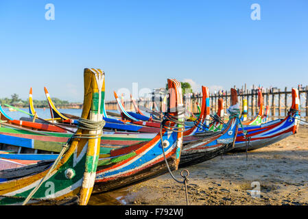 Mandalay, Myanmar boats on the Taungthaman Lake in front of U Bein Bridge. Stock Photo