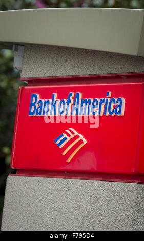 Seattle, Washingtion, USA. 23rd Nov, 2015. A Bank of America ATM with small roof, lights and security camera, located at Seattle Center, provides clients easy access to banking information and cash using a debit and or credit card. The BOFA atm is easily identified with letters printing out ''Bank of America, '' along with a small stylized design meant to represent the American flag in red, white and blue. © David Bro/ZUMA Wire/Alamy Live News Stock Photo