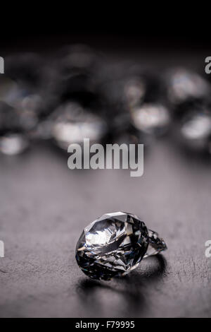 Shiny diamond on black background Stock Photo - Alamy