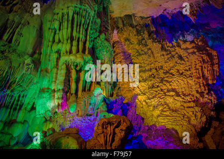 Reed Flute Caves - lit by coloured lights Guilin Region Guangxi, China LA008155 Stock Photo