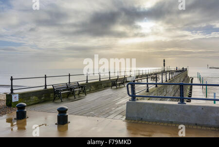 Cloudy skies on a wet day at Littlehampton Pier, Littlehampton, West Sussex, England, UK. Stock Photo
