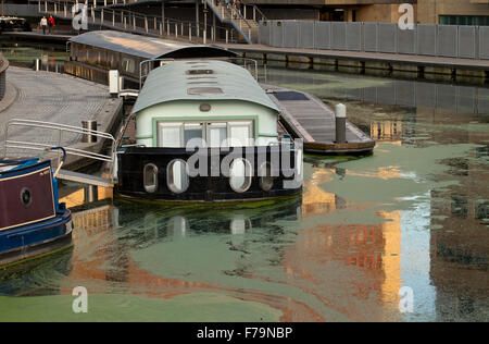 An Alternative Home. Living on board a narrow boat is popular along the canals of London. Stock Photo