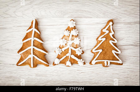 Christmas trees shaped gingerbread cookies. Yuletide. Merry Christmas. Coniferous forest. Stock Photo