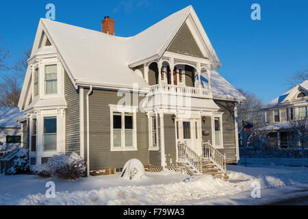 An older style North American home after a snowfall. Stock Photo