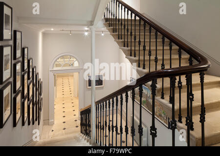 Keepers House, Royal Academy, London. Entrance hallway and staircase. Royal Academics pictured. Stock Photo