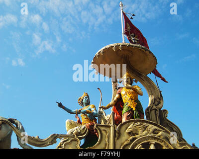 Lord Krishna preaching Bhagavadgita to Arjuna at battlefield in Kurukshetra Stock Photo