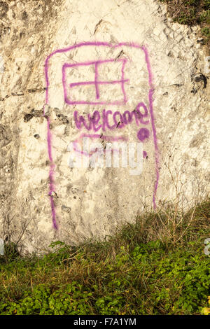 A sprayed door on the white chalk cliffs at Broadstairs, Kent, saying Welcome. UK Stock Photo