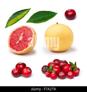 Set of cranberries, whole and sliced pink grapefruit isolated on white. Exploded view. Large depth of field Stock Photo