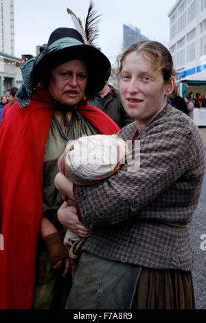 female destitute characters performing at the victorian festival of christmas 2015 portsmouth england uk Stock Photo