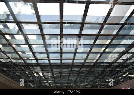 A open roof-top strip pattern with beautiful blue sky in background Stock Photo