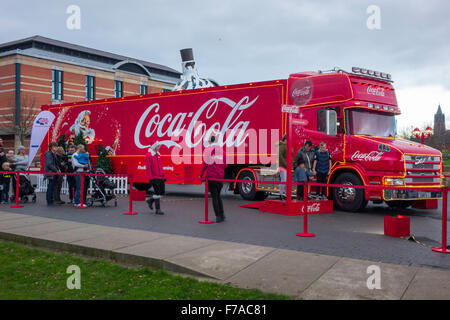 Middlesbrough, UK. November 27th 2015 3:00 pm Middlesbrough Cleveland UK.  The Coca Cola Big Truck on its annual Christmas promotional tour around the country visits Middlesbrough, where family and friends can take pictures with the truck and experience a snowy winter wonderland setting while enjoying a choice of Coca-Cola drink products Credit:  Peter Jordan NE/Alamy Live News Stock Photo