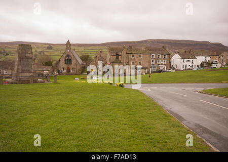 Picturesque view of Reeth village,Swaledale showing church, war memorial and village green Stock Photo