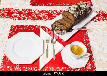 Christmas gingerbread cake with chocolate and hazelnuts. Stock Photo