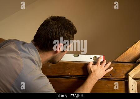 Accurate measurement plane using a spirit level. Stock Photo