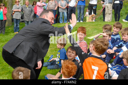 Alex Salmond MP with a group of children at an Easter photocall before the Scottish elections in 2011. Stock Photo