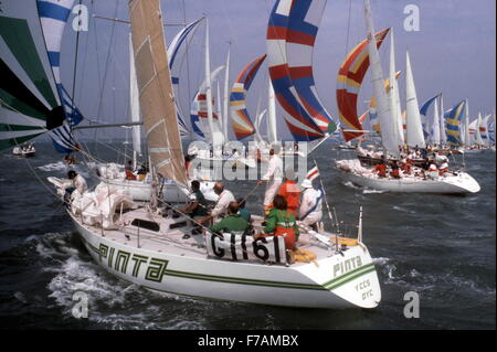 AJAXNETPHOTO. 1981. SOLENT, ENGLAND.  - ADMIRAL'S CUP - FLEET STARTING THE CHANNEL RACE, GERMANY'S PINTA IN FOREGROUND. PHOTO:JONATHAN EASTLAND/AJAX REF:1981 Stock Photo