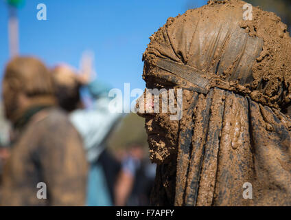 Iranian Shiite Muslim Woman Covered In Mud During Ashura, The Day Of The Death Of Imam Hussein, Kurdistan Province, Bijar, Iran Stock Photo