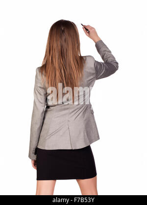 Business woman writing something with a marker on white background. Stock Photo