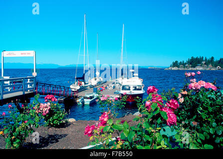 Lund, BC, British Columbia, Canada - Boats docked at Wharf, Sunshine Coast Scenic Harbour / Harbor, Terminus of Highway 101 Stock Photo