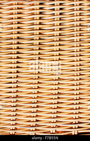 part of a chair made from brown woven cane Stock Photo