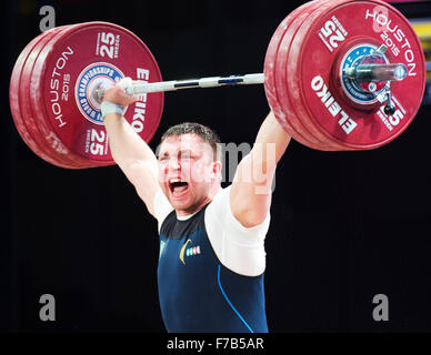 Houston, Texas, USA. November 26, 2015: Roman Zaitsev celebrates his 180kg snatch in the 105kg at the World Weightlifting Championships in Houston, Texas. Credit:  Brent Clark/Alamy Live News Stock Photo