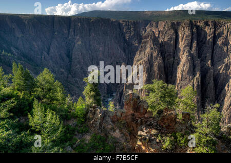 The Gunnison River flows 1700 feet below this viewpoint at the Visitor's Center of Black Canyon of the Gunnison National Park Stock Photo