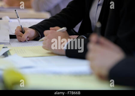 Lawyers writing notes during a court discussion Stock Photo