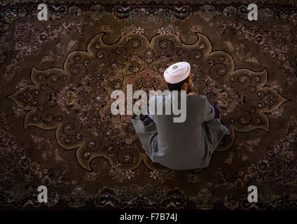 Iranian Shiite Muslim Kneeling And Praying In Mosque, Golestan Province, Karim Ishan, Iran Stock Photo