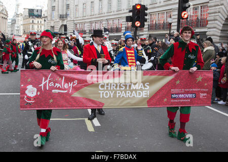 London, UK. 28 November 2015. The inaugural Hamleys Christmas Toy Parade takes place along Regent Street, which went traffic-free for the day. The parade organised by the world-famous toy store Hamleys featured over 50 of the nation's favourite children's characters along with 400 entertainers, a marching band and giant balloons. The parade is modelled on Macy's annual Thanksgiving Parade in New York. Credit:  Vibrant Pictures/Alamy Live News Stock Photo