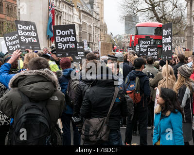 Westminster, London, UK. 28th November,2015. Protesters block Whitehall outside Downing Street to protest against planned attacks on Syria Credit:  Oliver Lynton/Alamy Live News Stock Photo
