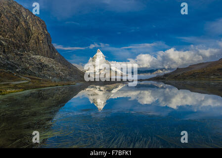 Lake Riffelsee, Mountain Matterhorn, Monte Cervino, Mont Cervin, 4.478 m, Rotenboden, Pennine Alps, Zermatt, Valais, Switzerland Stock Photo