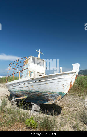 An old decaying wooden Greek fishing boat at a boat yard in Astrakeri, Corfu Stock Photo
