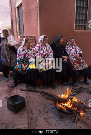 Portrait Of Iranian Women Wearing Traditional Floreal Chadors In Zoroastrian Village, Isfahan Province, Abyaneh, Iran Stock Photo