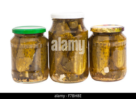 Pickled cucumbers in jars isolated on white Stock Photo