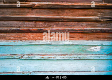Old wooden background half painted in blue Stock Photo