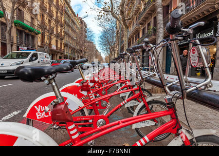Bicing bicycles sharing station on the street of Barcelona. Stock Photo