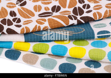Stack of colorful kitchen towels closeup picture. Stock Photo