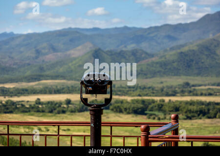 Farmhouse, farmer's cottage, barn for drying tobacco leaves, tobacco fields and the mountains of Mogotes, Viñales Valley with ka Stock Photo