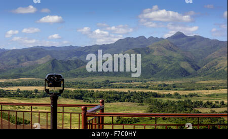 Farmhouse, farmer's cottage, barn for drying tobacco leaves, tobacco fields and the mountains of Mogotes, Viñales Valley with ka Stock Photo