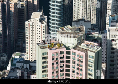 Hong Kong, 20 February 2014  Hong Kong view of the Mid-Level neighbourhood on Hong Kong Island. The roofs of the skyscrapers are Stock Photo