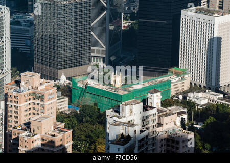 Hong Kong, 20 February 2014  Hong Kong view of the tower of St John's Cathedral and the Chief Executive's residence on Hong Kong Stock Photo