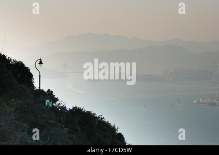 Hong Kong, 20 February 2014  Hong Kong view of the harbour and Kowloon skyline from Lugard road on the Peak on Hong Kong Island. Stock Photo