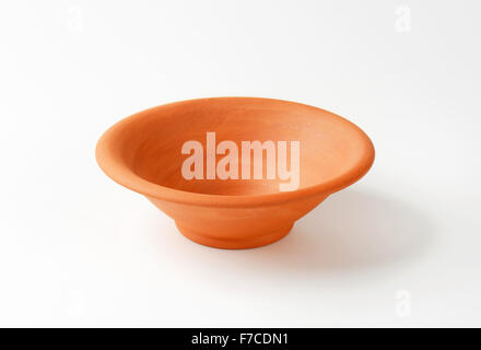 Empty round red clay bowl Stock Photo